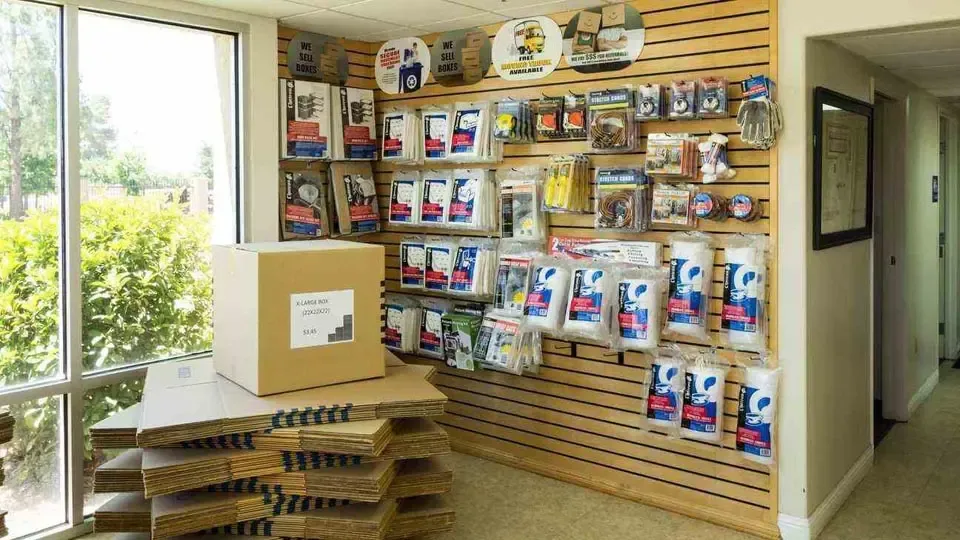Inside storage office with moving and packing supplies on display